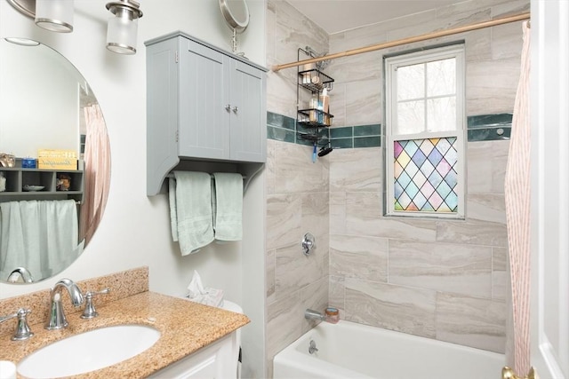 bathroom with shower / bath combo with shower curtain and vanity