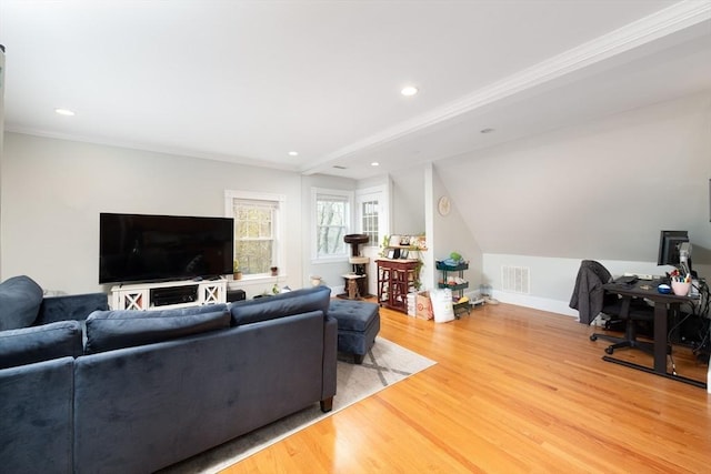 living room featuring light wood-style floors, recessed lighting, baseboards, lofted ceiling, and visible vents