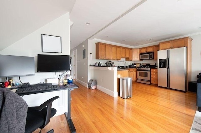kitchen with crown molding, dark countertops, appliances with stainless steel finishes, light wood-type flooring, and open floor plan