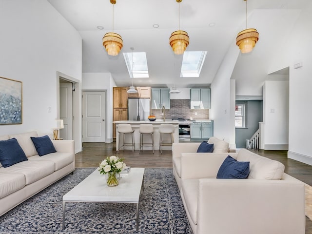 living room with sink, dark wood-type flooring, and high vaulted ceiling