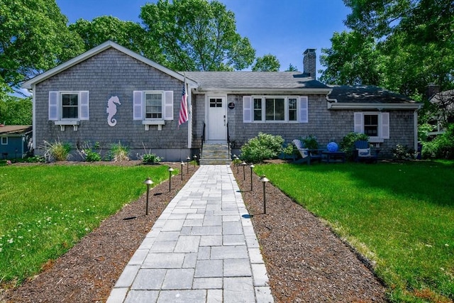 8 Highland View Ave, Mattapoisett, MA 02739 - ranch-style home featuring a chimney, a front yard, and a shingled roof