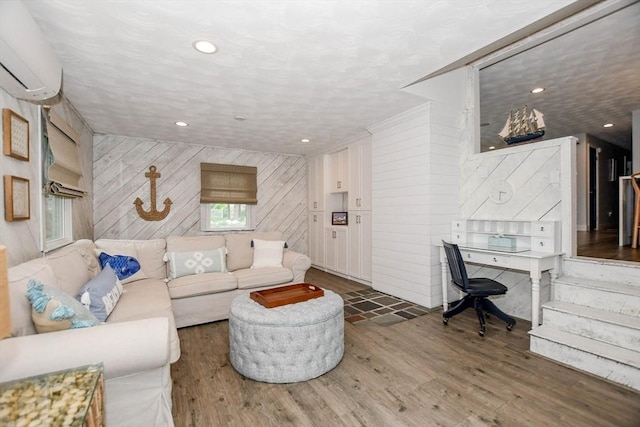 8 Highland View Ave, Mattapoisett, MA 02739 - living room featuring wood walls, a wall mounted air conditioner, and wood finished floors