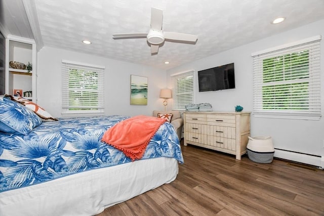 8 Highland View Ave, Mattapoisett, MA 02739 - bedroom with wood finished floors, a baseboard radiator, recessed lighting, and a ceiling fan