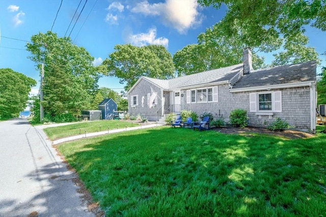 8 Highland View Ave, Mattapoisett, MA 02739 - ranch-style house with a front yard and a chimney