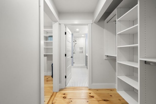 16 Walking Stick, Plymouth, MA 02360 - walk in closet featuring wood finished floors
