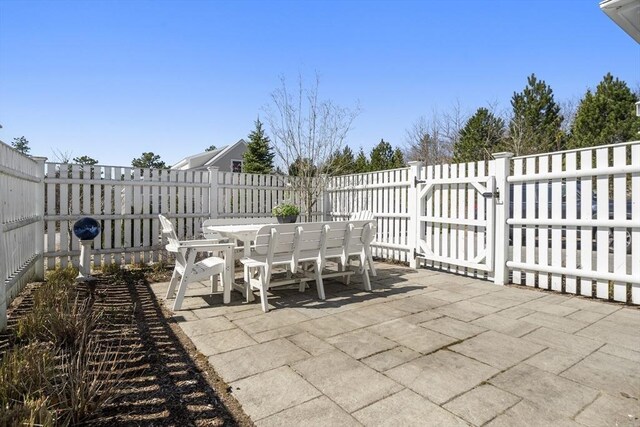 16 Walking Stick, Plymouth, MA 02360 - fenced backyard featuring outdoor dining space and a patio