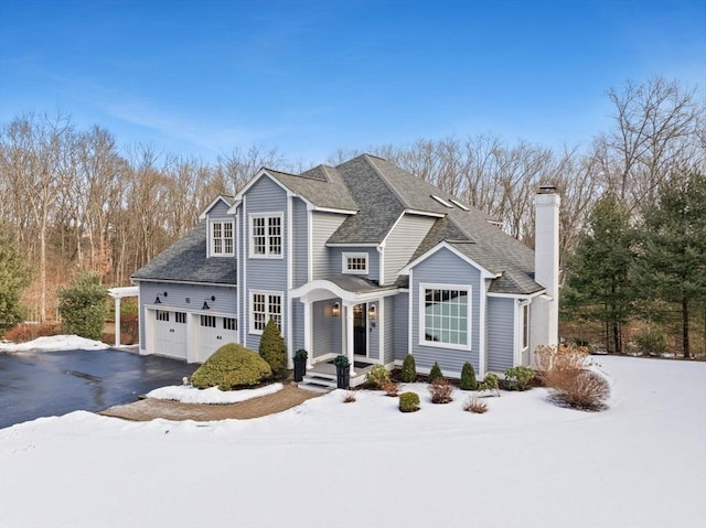 front of property featuring a garage