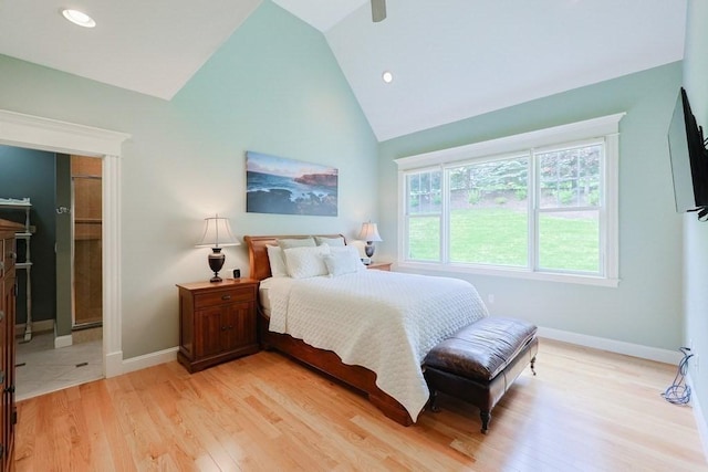 bedroom featuring light wood-style floors, baseboards, recessed lighting, high vaulted ceiling, and a ceiling fan