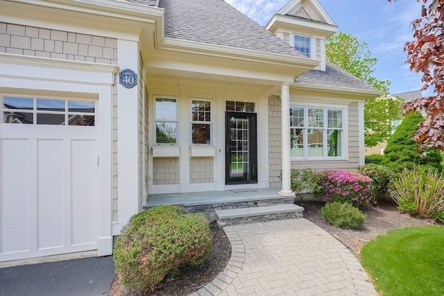 property entrance with a shingled roof