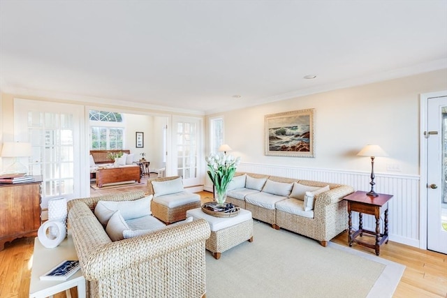 6 Snow Way, Orleans, MA 02653 - living room featuring light wood-style floors and ornamental molding