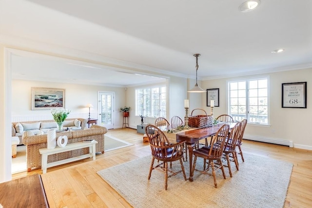 6 Snow Way, Orleans, MA 02653 - dining area with baseboard heating, ornamental molding, baseboards, light wood-style flooring, and recessed lighting