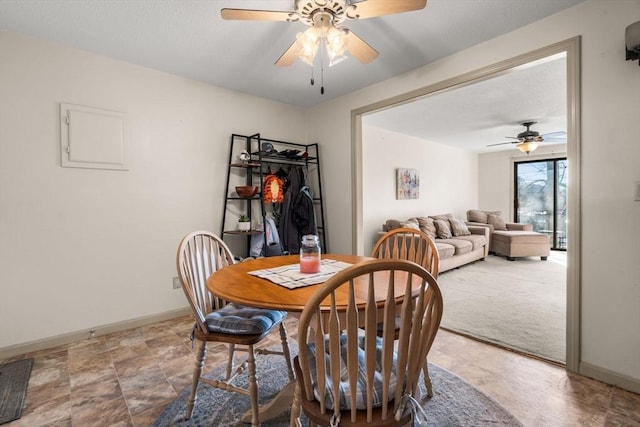 dining area featuring ceiling fan