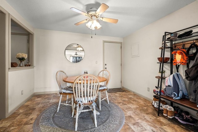 dining area with ceiling fan