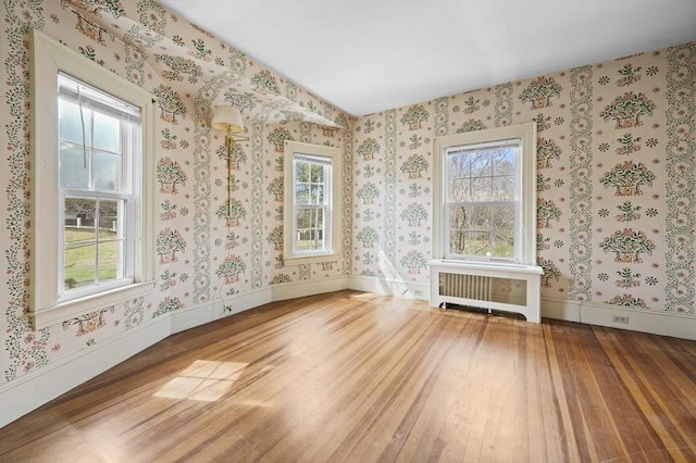 116 Adin St, Hopedale, MA 01747 - unfurnished room featuring radiator, hardwood / wood-style floors, and baseboards
