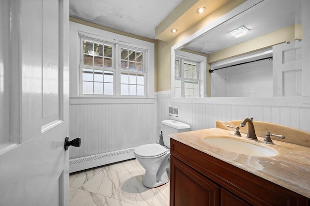 116 Adin St, Hopedale, MA 01747 - bathroom featuring a baseboard radiator, marble look tile flooring, toilet, a wainscoted wall, and vanity
