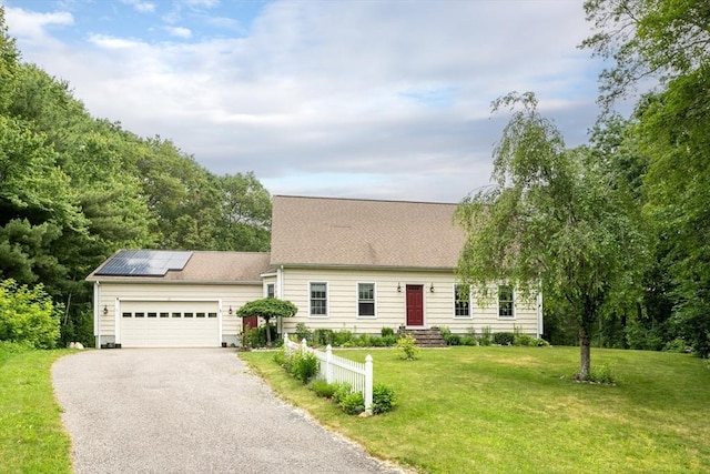 29 Miscoe Rd, Mendon, MA 01756 - cape cod house with driveway, roof mounted solar panels, a front yard, and a garage