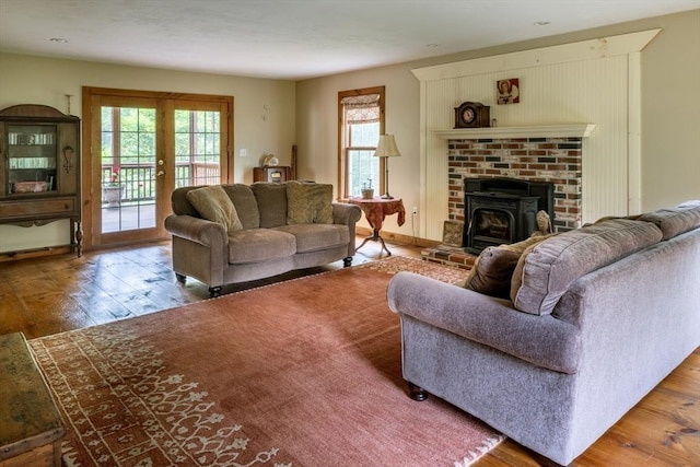 29 Miscoe Rd, Mendon, MA 01756 - living room with wood-type flooring and a fireplace