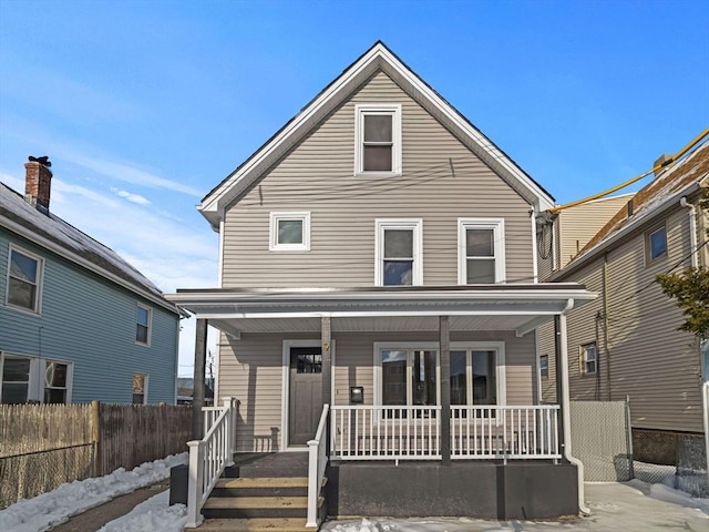 front of property featuring covered porch