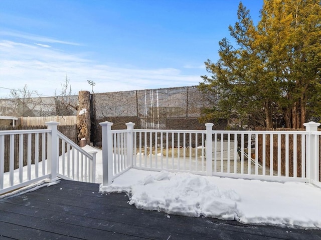 view of snow covered deck