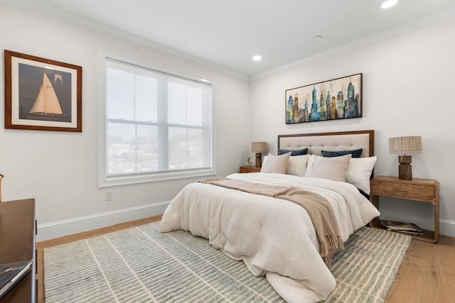 18 Franklin Unit 202, Salem, MA 01970 - bedroom with baseboards, recessed lighting, crown molding, and light wood-type flooring