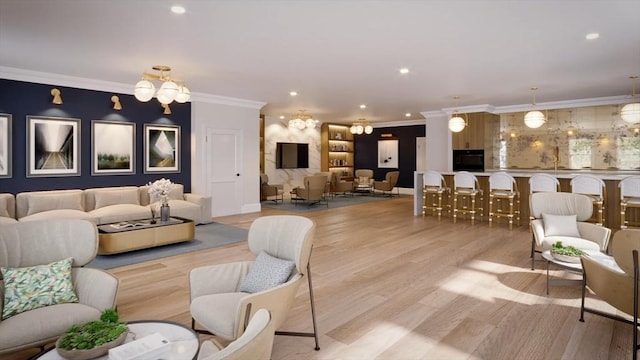 18 Franklin Unit 202, Salem, MA 01970 - living area featuring crown molding, a chandelier, light wood-style flooring, and recessed lighting