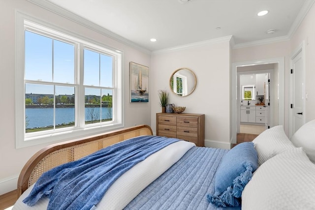 18 Franklin Unit 202, Salem, MA 01970 - bedroom featuring baseboards, a water view, crown molding, and recessed lighting