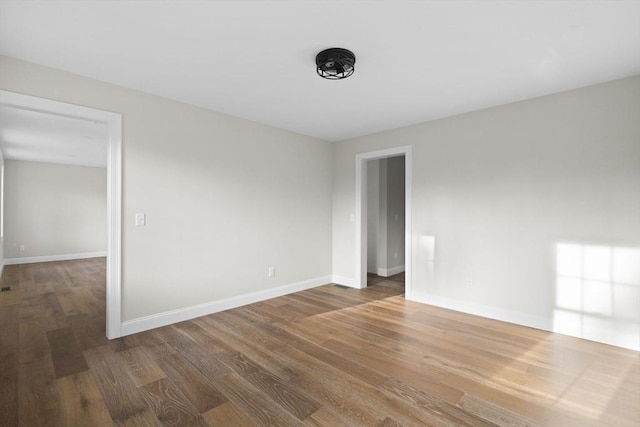 unfurnished room featuring hardwood / wood-style floors