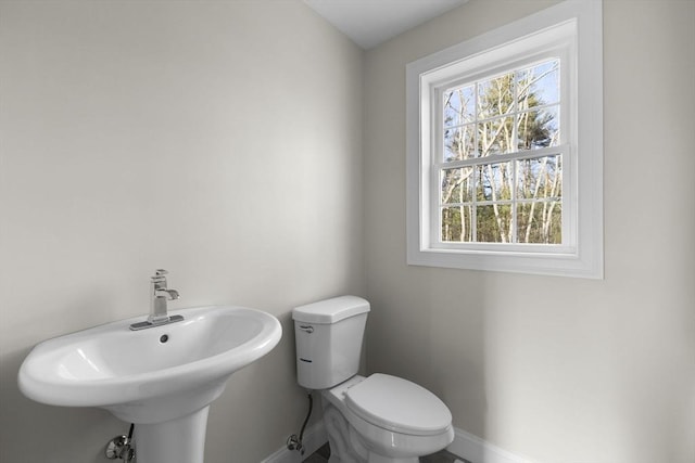 bathroom with sink and toilet