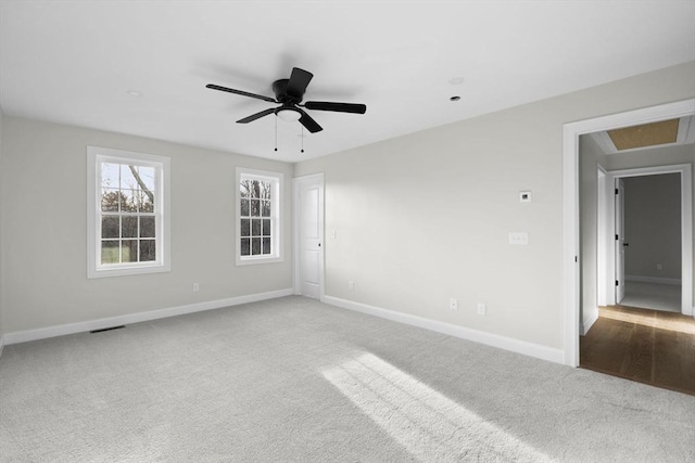 unfurnished room featuring carpet flooring and ceiling fan