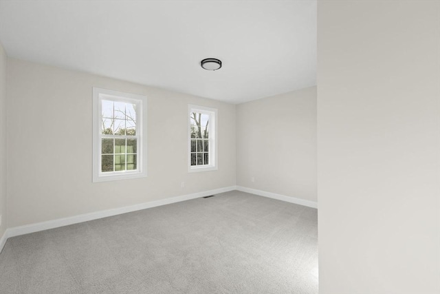 unfurnished room with carpet