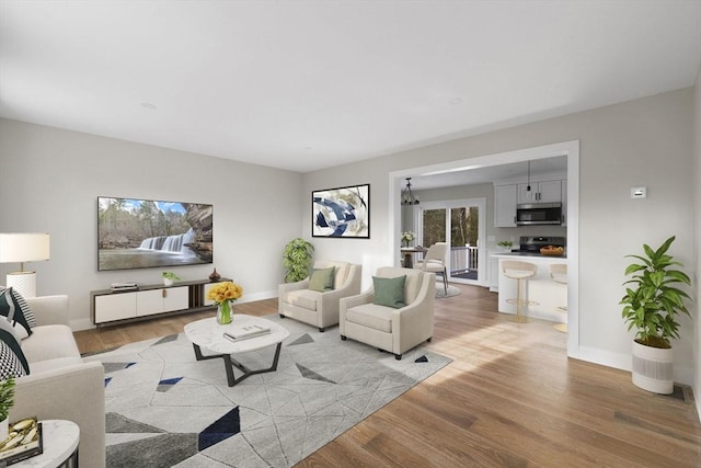 living room with light hardwood / wood-style floors