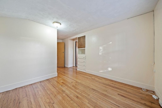 2 Hammond Ct, Quincy, MA 02169 - unfurnished room featuring baseboards and light wood finished floors