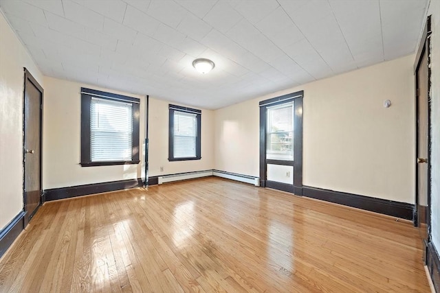 2 Hammond Ct, Quincy, MA 02169 - spare room featuring hardwood / wood-style floors, plenty of natural light, and baseboards