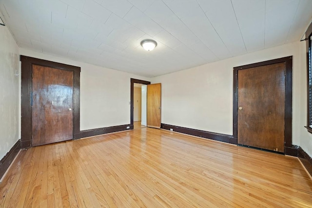 2 Hammond Ct, Quincy, MA 02169 - spare room with light wood-style floors and baseboards