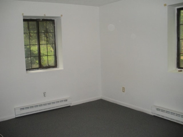 47 W St Unit A2, Randolph, MA 02368 - carpeted spare room with baseboard heating, a baseboard heating unit, and baseboards