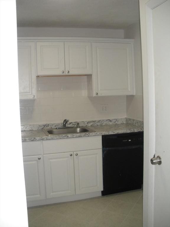 47 W St Unit A2, Randolph, MA 02368 - kitchen featuring a sink, dishwasher, white cabinetry, and light countertops