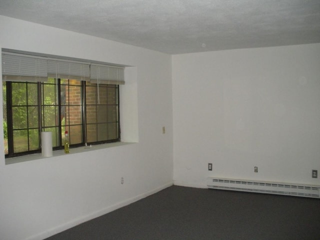 47 W St Unit A2, Randolph, MA 02368 - unfurnished room with a baseboard heating unit and baseboards