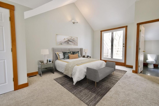 39 Bellis Cir Unit E, Cambridge, MA 02140 - bedroom with connected bathroom, light carpet, visible vents, baseboards, and vaulted ceiling