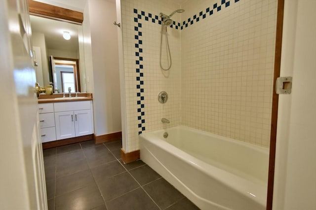 39 Bellis Cir Unit E, Cambridge, MA 02140 - full bath featuring vanity, tile patterned flooring, baseboards, and tub / shower combination