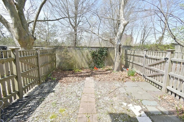 39 Bellis Cir Unit E, Cambridge, MA 02140 - view of yard featuring a gate and a fenced backyard