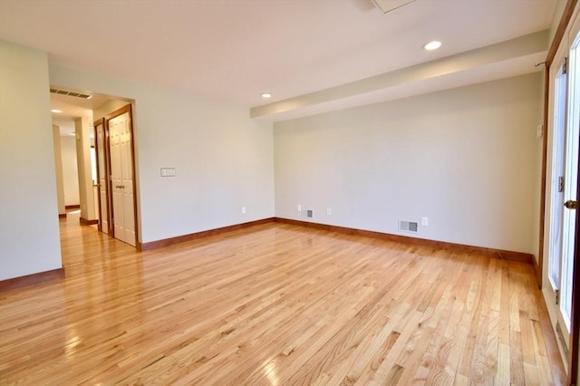 39 Bellis Cir Unit E, Cambridge, MA 02140 - unfurnished room with light wood-style floors, baseboards, recessed lighting, and visible vents
