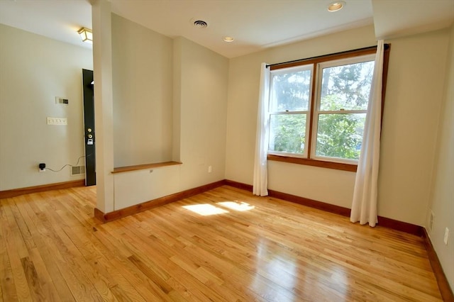 39 Bellis Cir Unit E, Cambridge, MA 02140 - spare room with baseboards, light wood-type flooring, and visible vents
