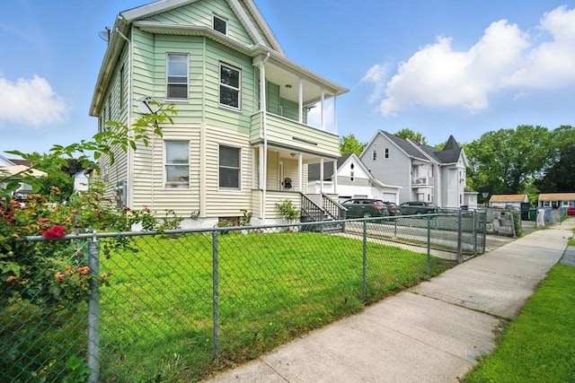 16 Laurel St, Springfield, MA 01107 - view of front of house with a residential view, a balcony, and covered porch