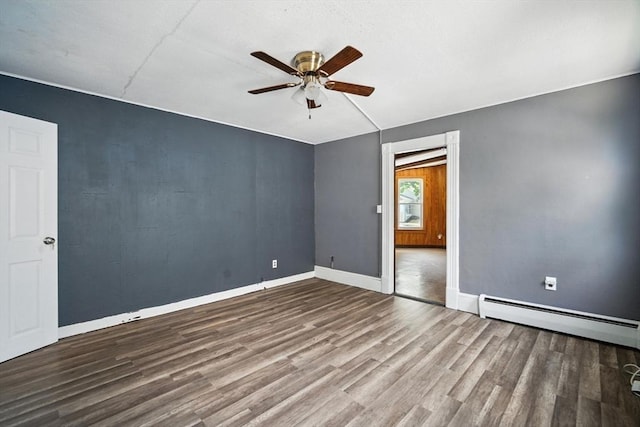 16 Laurel St, Springfield, MA 01107 - spare room featuring baseboard heating, ceiling fan, and wood finished floors