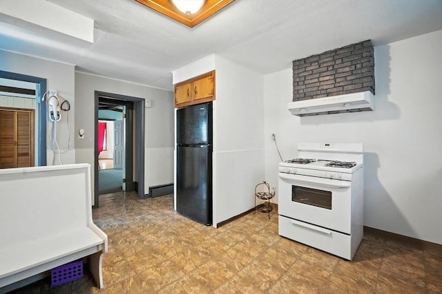 16 Laurel St, Springfield, MA 01107 - kitchen featuring white range with gas cooktop, freestanding refrigerator, under cabinet range hood, and brown cabinets