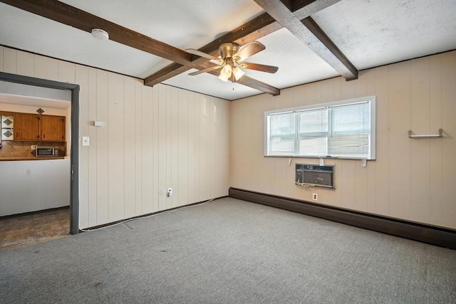 16 Laurel St, Springfield, MA 01107 - unfurnished room with a baseboard radiator, ceiling fan, beam ceiling, a smoke detector, and carpet flooring