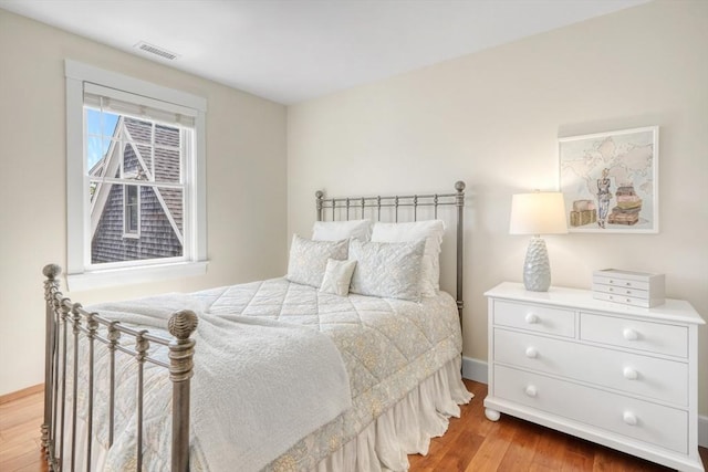 27 Watcha Path, Edgartown, MA 02539 - bedroom featuring light wood-type flooring and baseboards