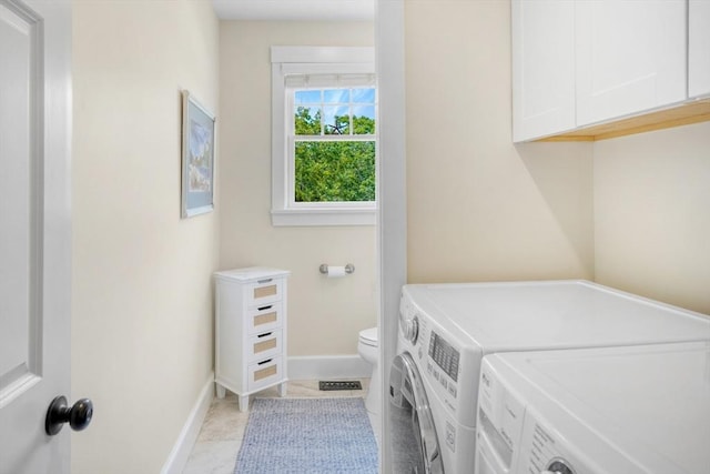 27 Watcha Path, Edgartown, MA 02539 - laundry room with washing machine and clothes dryer and light tile patterned floors
