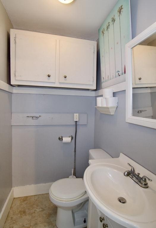 31 E St, Stafford, CT 06076 - half bathroom featuring a sink and toilet