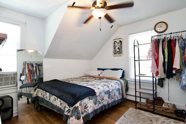 31 E St, Stafford, CT 06076 - bedroom featuring wood finished floors, vaulted ceiling, a ceiling fan, and a baseboard radiator
